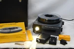 Kodak Carousel S-av 2000 35MM Film Slide Projector + Timer & Ir Cordless Remote Used. Price: $543.64.
